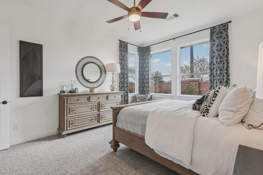 Representative furnished interior of a home built from the Oxford by Chesmar Homes in Bridgeland, Elgin (Image 7).