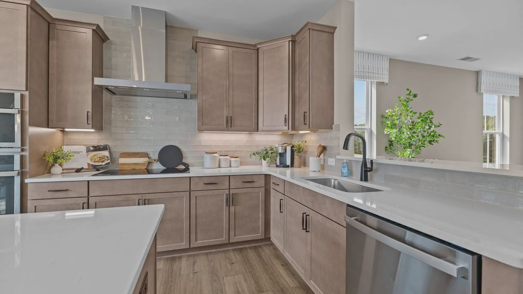 Furnished interior view inside a new home in The River District Townhomes, Charlotte (Image 7). Furnished interior view inside a new home in The River District Townhomes, Charlotte (Image 7).