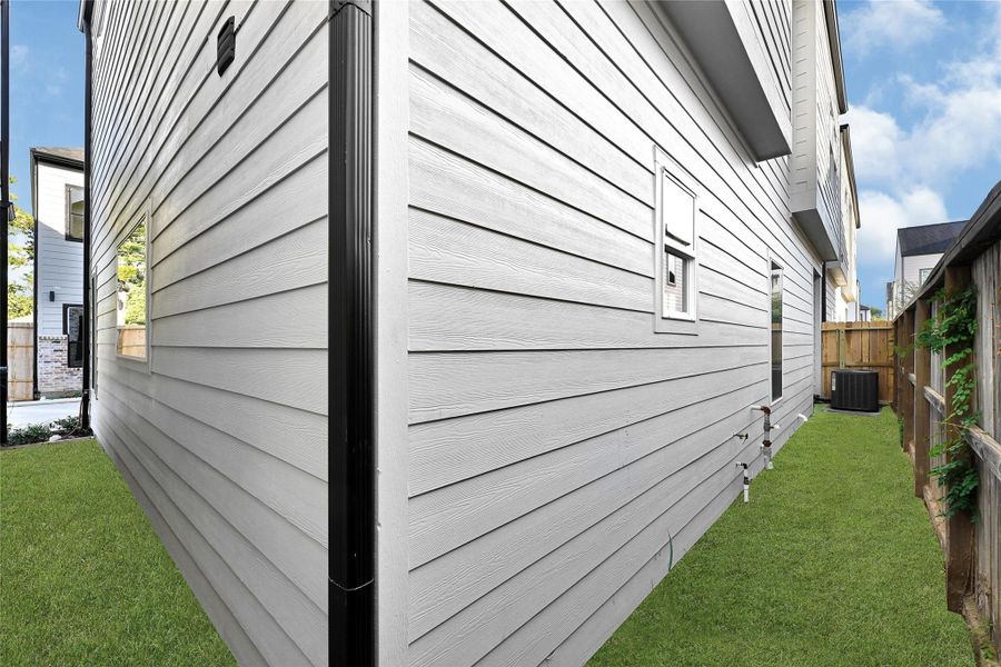 Exterior details and patio area of a home in , Houston (Image 4). Exterior details and patio area of a home in , Houston (Image 4).