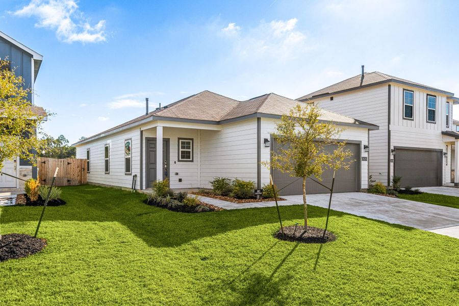 Front exterior of a new home in Northpark South, Porter, TX, highlighting curb appeal (Image 22).