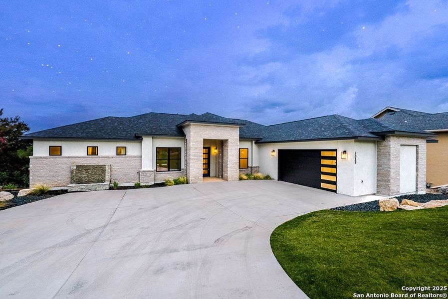 Front exterior of a new home in , Kerrville, TX, highlighting curb appeal (Image 24). Front exterior of a new home in , Kerrville, TX, highlighting curb appeal (Image 24).