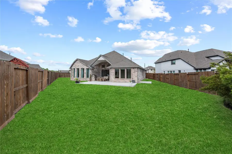 Exterior details and patio area of a home in , Cypress (Image 3).