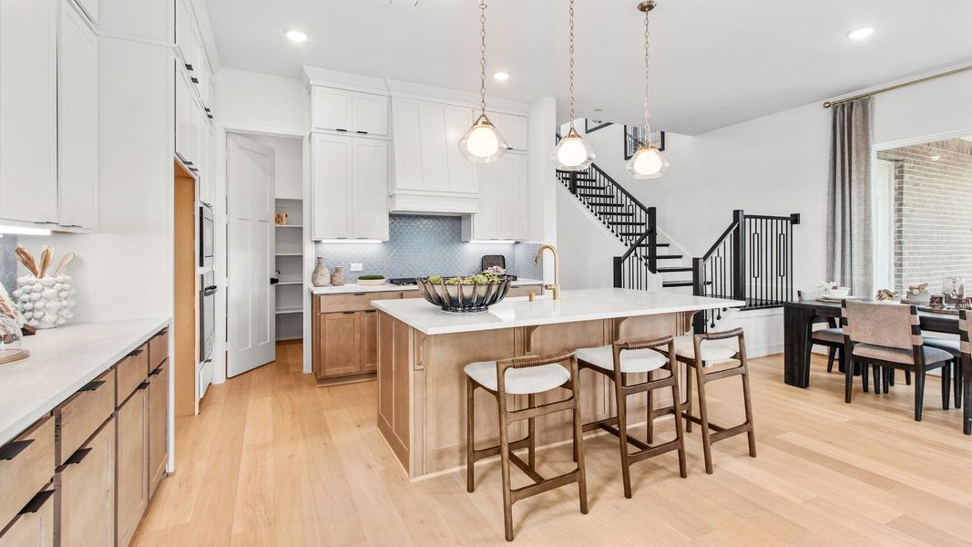 Representative furnished interior of a home built from the Tivoli by Brightland Homes in Bridgeland Central, Cypress (Image 7).