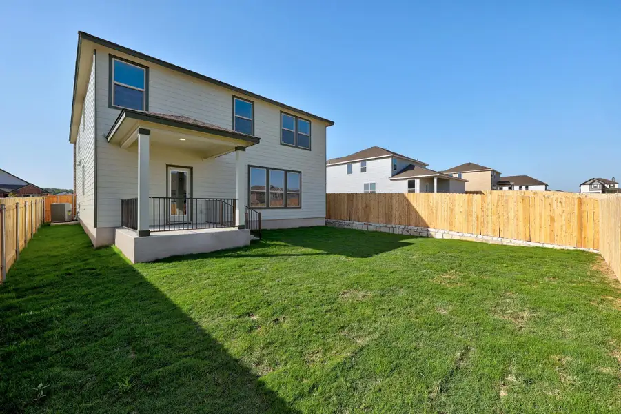Front exterior of a new home in Sonterra - Cool Water, Jarrell, TX, highlighting curb appeal (Image 1).