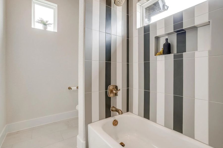 Representative furnished interior of a home built from the The Carley by Elmwood Custom Homes in Matthews Farm, Venus (Image 26).