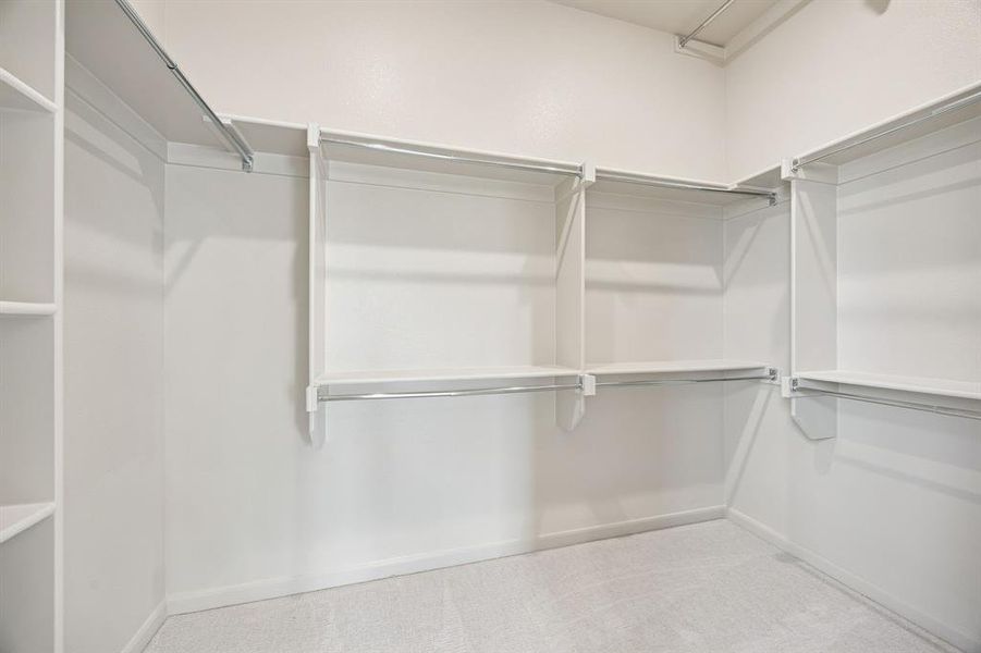 Featuring seasonal hanging racks and plenty of space, your dream owner's closet awaits!