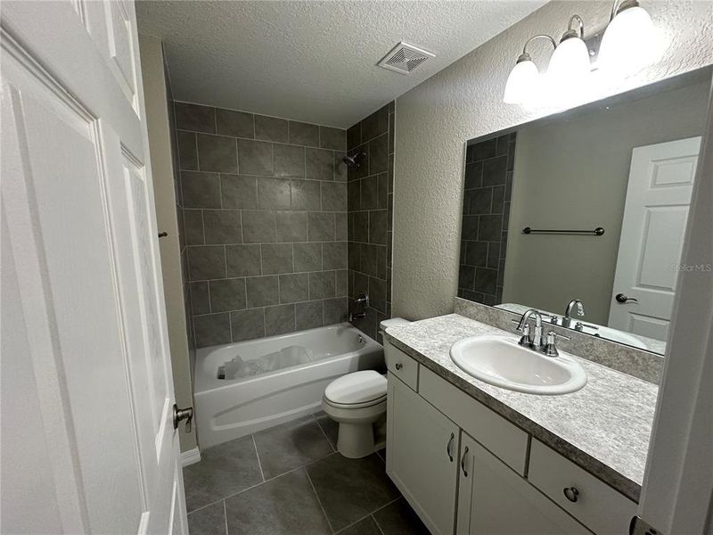 Furnished interior view inside a new home in , Dunnellon (Image 7).