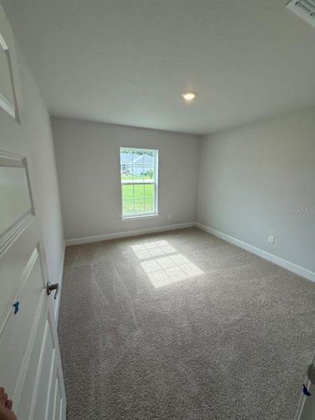Spacious, unfurnished interior of a new home in St. James Park, Ocala (Image 9).