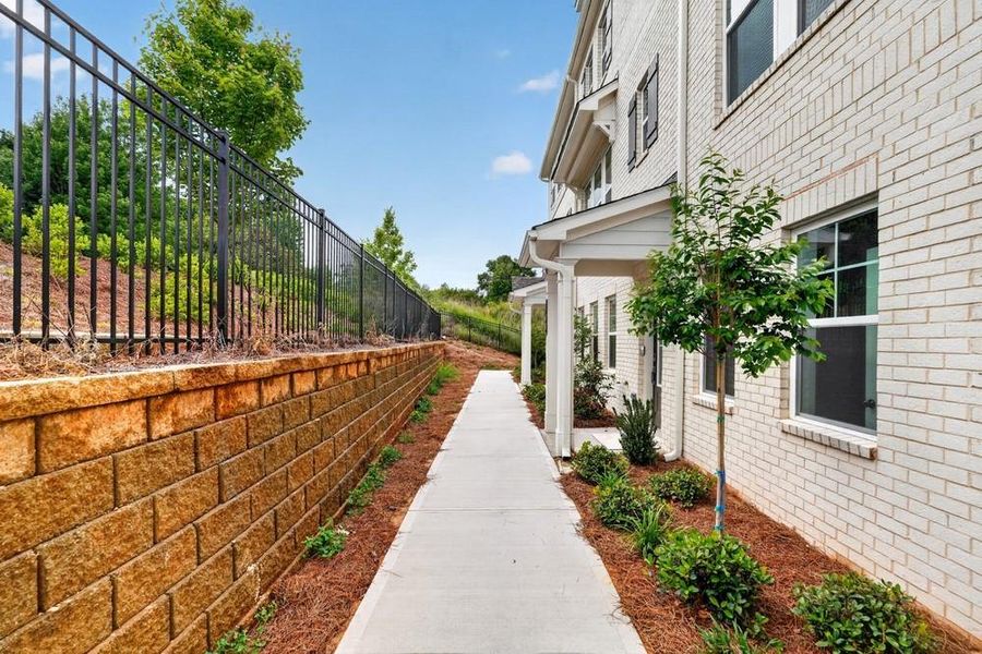 Exterior details and patio area of a home in Chandler Run, Tucker (Image 25). Exterior details and patio area of a home in Chandler Run, Tucker (Image 25).