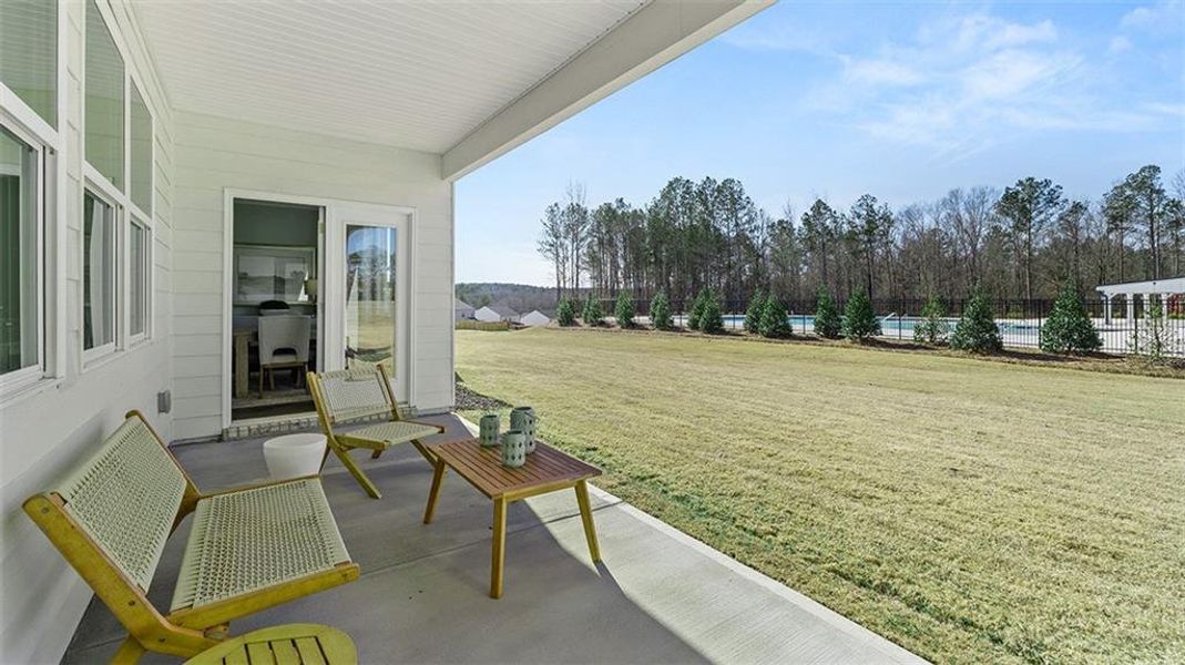 Exterior details and patio area of a home in Kingston Ranch at Lake Oconee, Buckhead (Image 23).