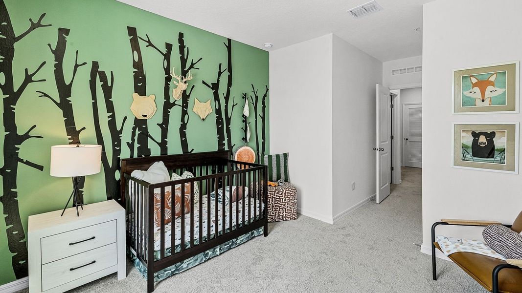 Furnished interior view inside a new home in Nona West, Orlando (Image 14).