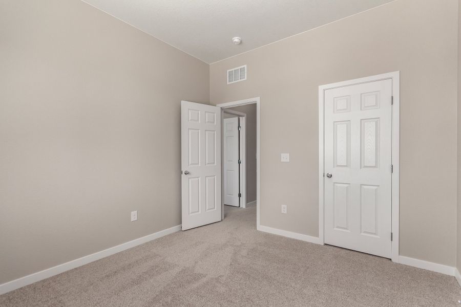 Spacious, unfurnished interior of a new home in Painted Prairie, Aurora (Image 18).