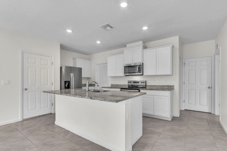 Furnished interior view inside a new home in , Port St. Lucie (Image 7).