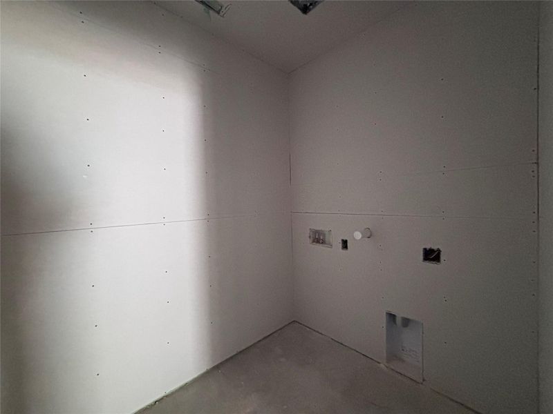 In-progress construction of a new home in The Colony, Bastrop, TX (Image 32).