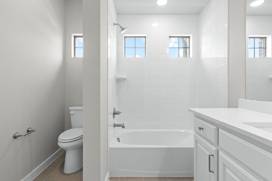 Furnished interior view inside a new home in The Tribute, The Colony (Image 36).
