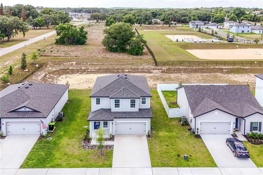 Front exterior of a new home in , Astatula, FL, highlighting curb appeal (Image 21). Front exterior of a new home in , Astatula, FL, highlighting curb appeal (Image 21).