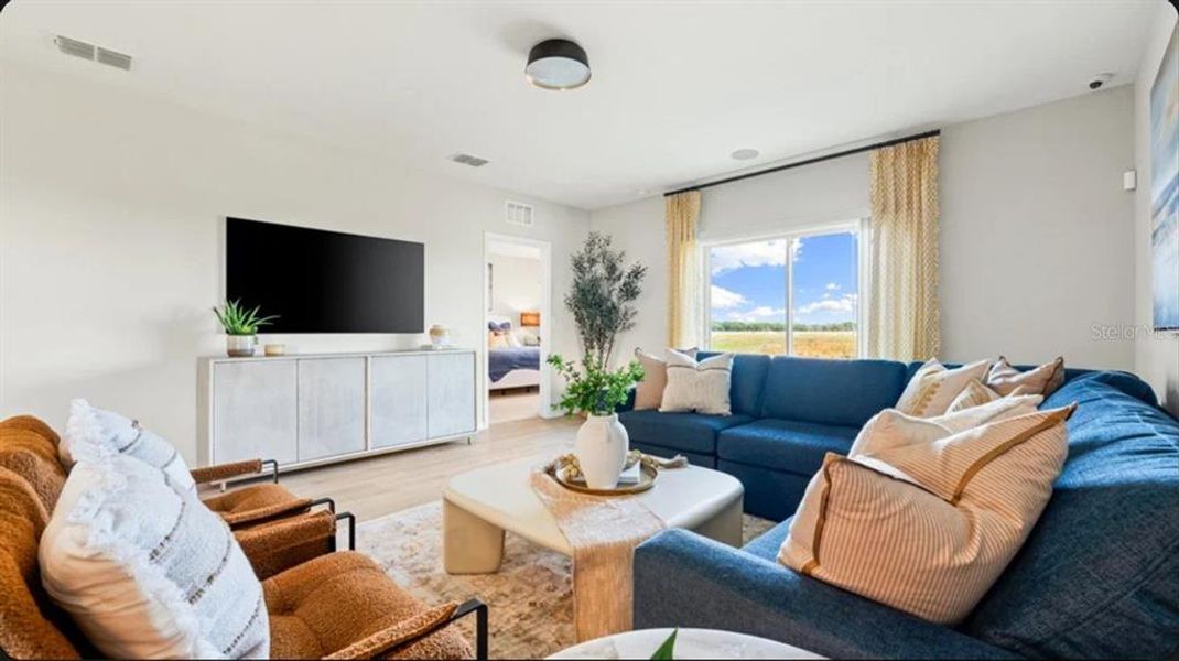 Furnished interior view inside a new home in Coasterra Community Group Page, Palmetto (Image 3). Furnished interior view inside a new home in Coasterra Community Group Page, Palmetto (Image 3).
