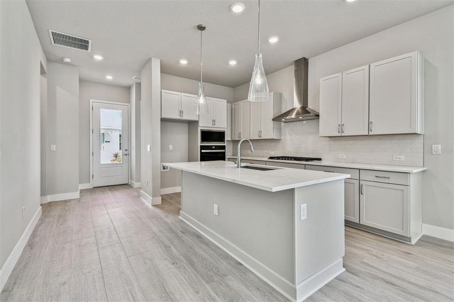 Furnished interior view inside a new home in Emerald Landing at Waterside at Lakewood Ranch – Cottage Series, Sarasota (Image 9). Furnished interior view inside a new home in Emerald Landing at Waterside at Lakewood Ranch – Cottage Series, Sarasota (Image 9).