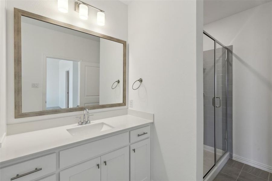 You'll find a spacious walk in shower in this dream bath!