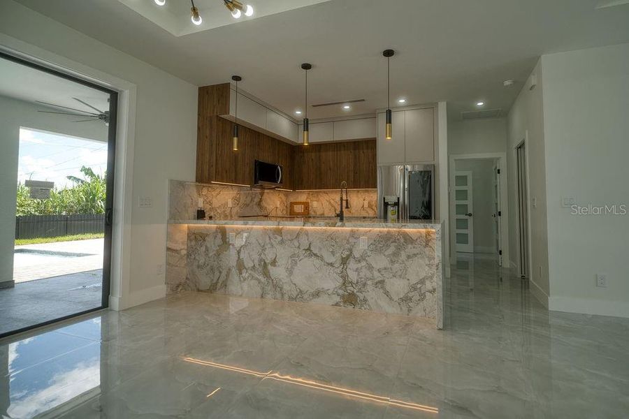 Furnished interior view inside a new home in , Port Charlotte (Image 3).