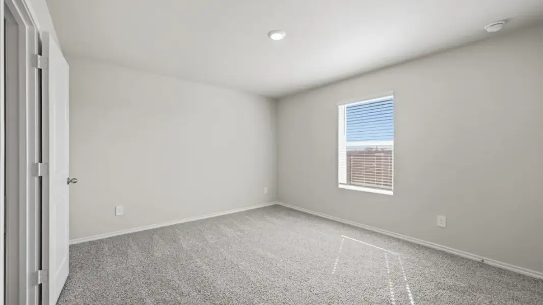 Representative unfurnished interior of a home built from the Caprock by D.R. Horton in Blackbird Estates, Mineral Wells (Image 22).