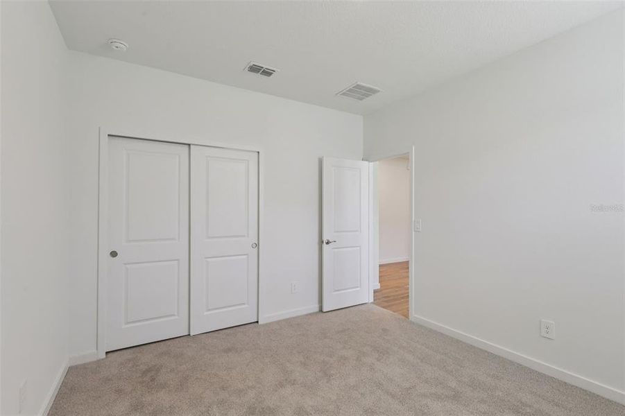 Spacious, unfurnished interior of a new home in Colbert Landings, Palm Coast (Image 15).
