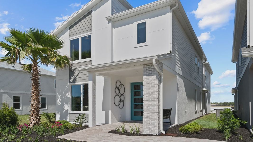 Representative exterior photo of a completed home built from the Ambersweet by DRB Homes in Trinity Place, St. Cloud, FL (Image 2). Representative exterior photo of a completed home built from the Ambersweet by DRB Homes in Trinity Place, St. Cloud, FL (Image 2).