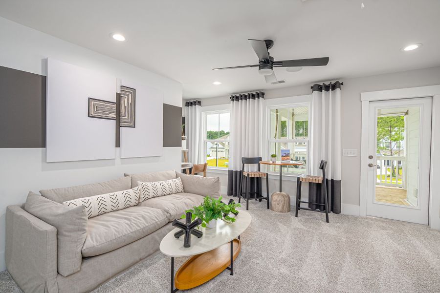Representative furnished interior of a home built from the Woodward by Pulte Homes in Solserra, Shallotte (Image 13).