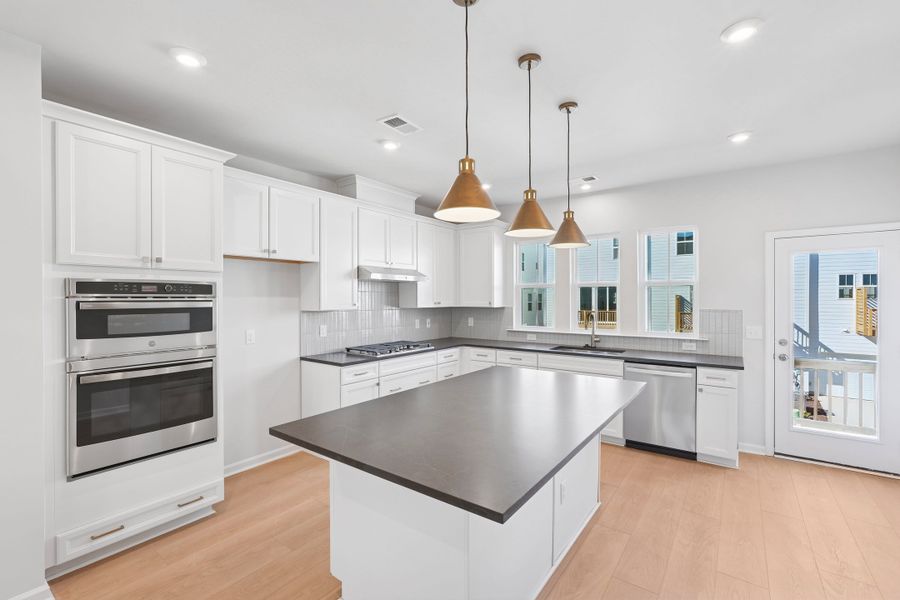 Representative furnished interior of a home built from the Nola by Tri Pointe Homes in The Grove at Latta Park, Durham (Image 5).