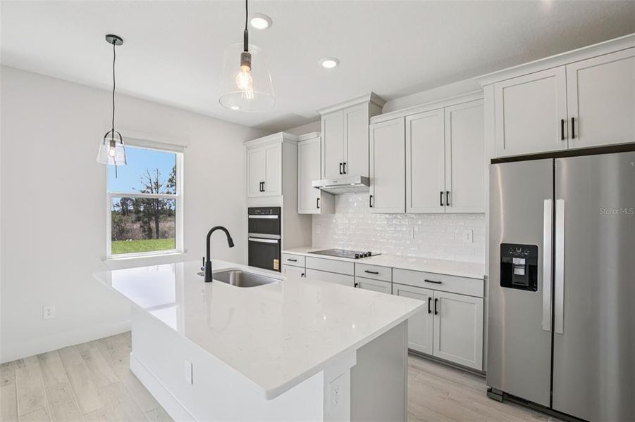 Furnished interior view inside a new home in Magnolia Bay - Reserve Series, Nokomis (Image 13).