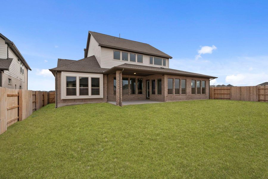 Rear of Home and Private Backyard