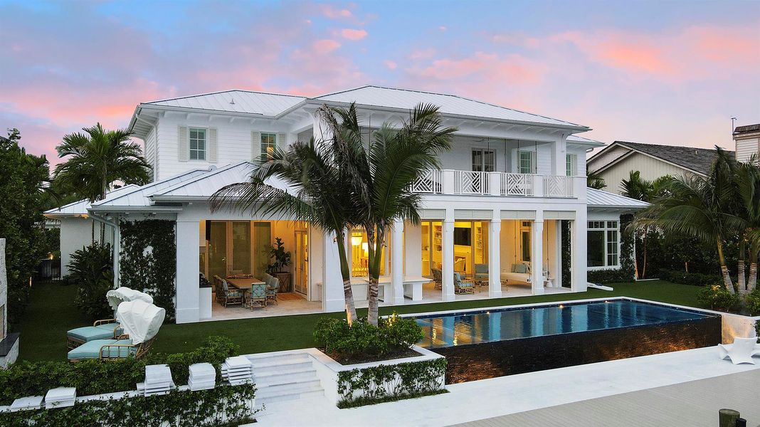 Front exterior of a new home in , North Palm Beach, FL, highlighting curb appeal (Image 28). Front exterior of a new home in , North Palm Beach, FL, highlighting curb appeal (Image 28).