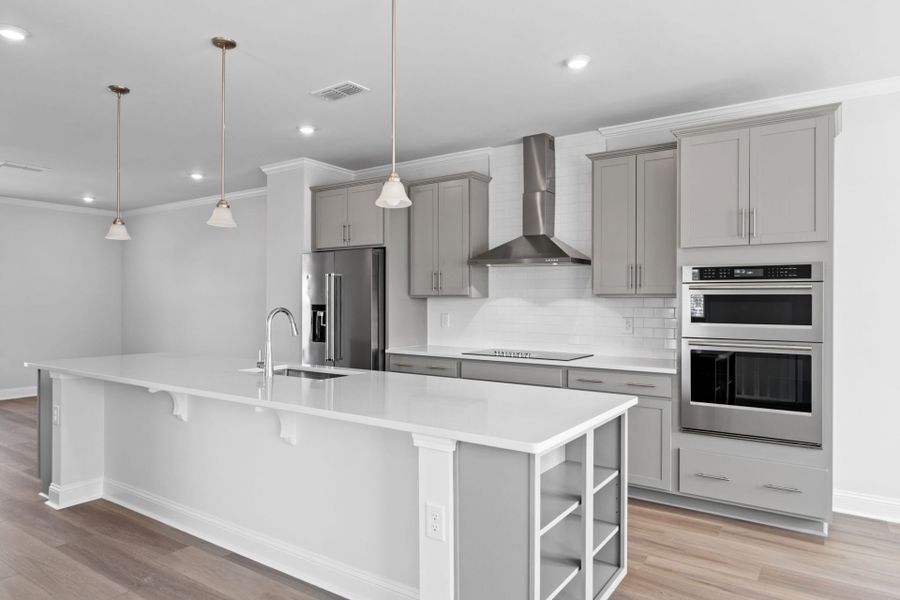 Furnished interior view inside a new home in Lakeside Townes at Riverlights, Wilmington (Image 6).