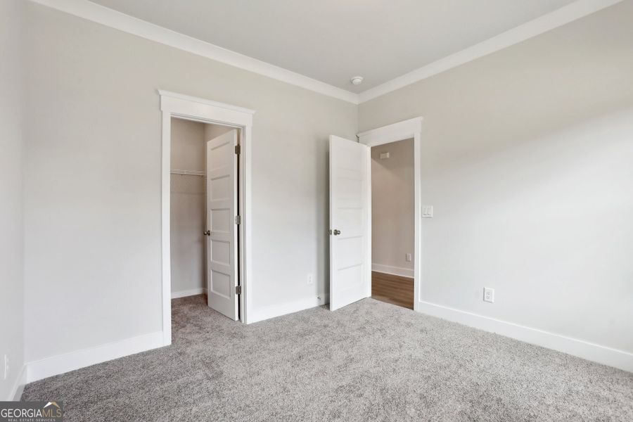 Spacious, unfurnished interior of a new home in Enclave at Logan Point, Loganville (Image 12).