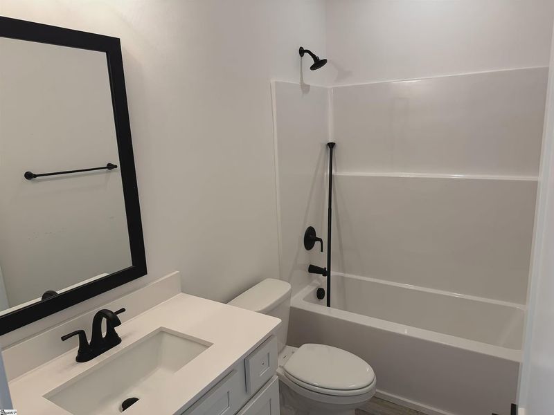 Furnished interior view inside a new home in Hidden Lake Estates, Greenville (Image 6).