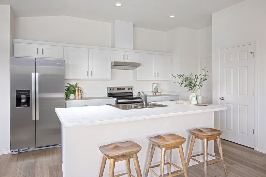 Furnished interior in a model home at Heron Glen in Palmetto (Image 9).