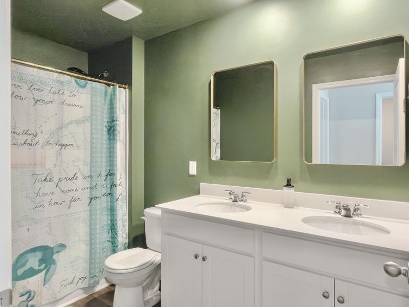 Furnished interior view inside a new home in Pine Hills at Cane Bay, Summerville (Image 16). Furnished interior view inside a new home in Pine Hills at Cane Bay, Summerville (Image 16).