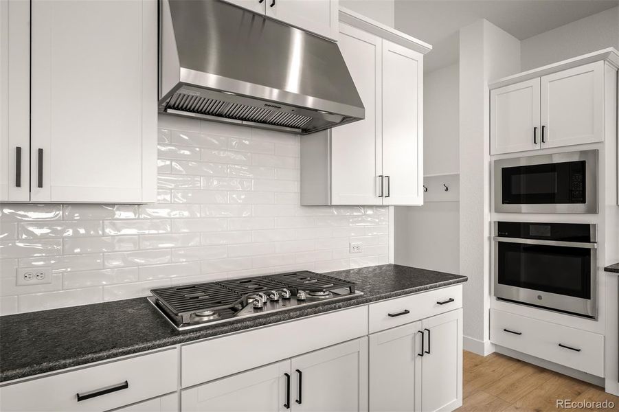 Furnished interior view inside a new home in Wolf Ranch - Enclave Collection, Colorado Springs (Image 9).