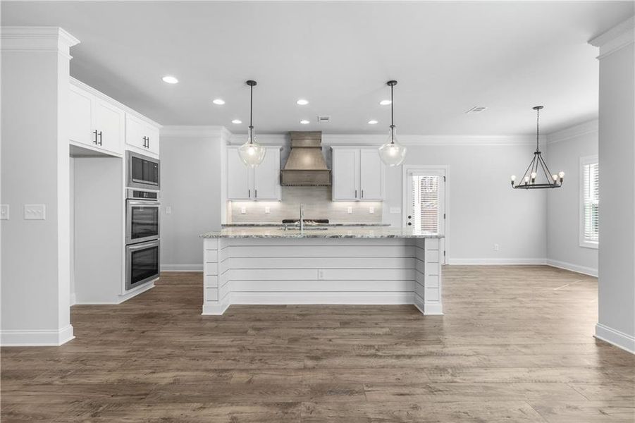 Furnished interior view inside a new home in Calgary Downs, Winder (Image 9).