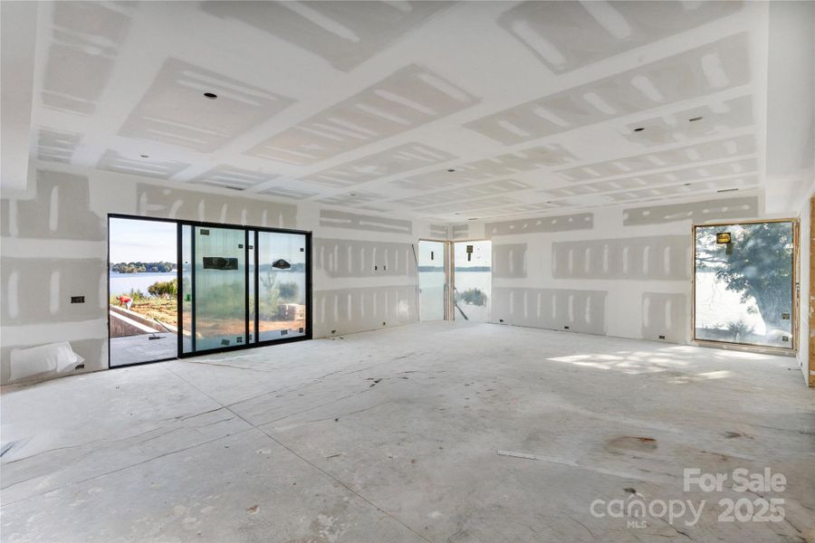 Second Living Room/Game Room/or Flex Space. Access to pool area.