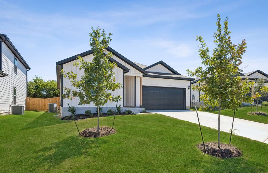 Front exterior of a new home in Skyview, Belton, TX, highlighting curb appeal (Image 17). Front exterior of a new home in Skyview, Belton, TX, highlighting curb appeal (Image 17).