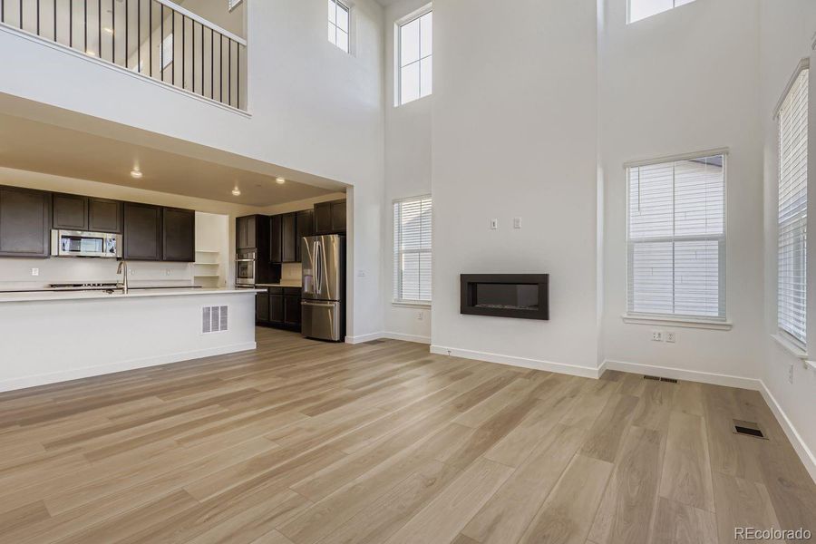 Spacious, unfurnished interior of a new home in Sunset Village: The Grand Collection, Erie (Image 8).