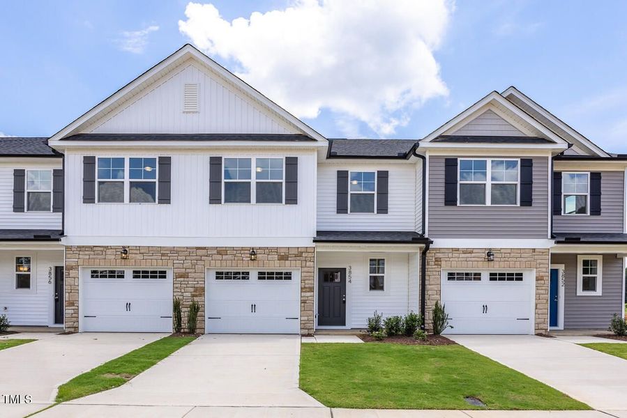 Front exterior of a new home in Springvale, Fuquay Varina, NC, highlighting curb appeal (Image 66).