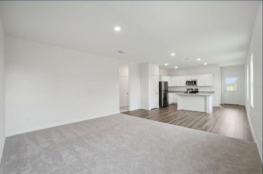 Spacious, unfurnished interior of a new home in Vacek Pointe, Richmond (Image 14).