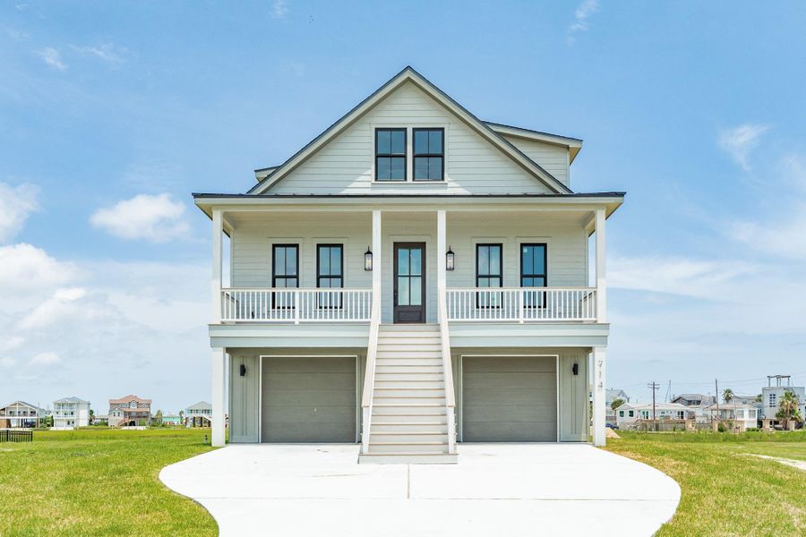 Front exterior of a new home in , Galveston, TX, highlighting curb appeal (Image 2).