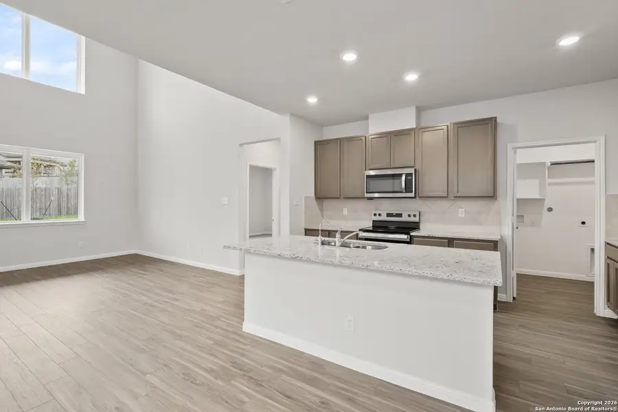 Furnished interior view inside a new home in Cinco Lakes, San Antonio (Image 6).