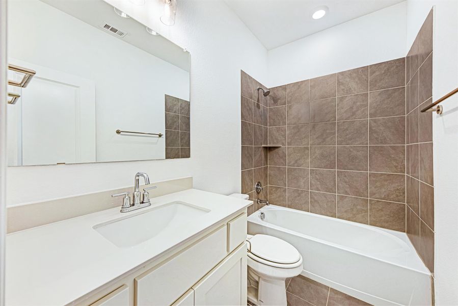 Brown Townhome Bathroom by Ashton Woods