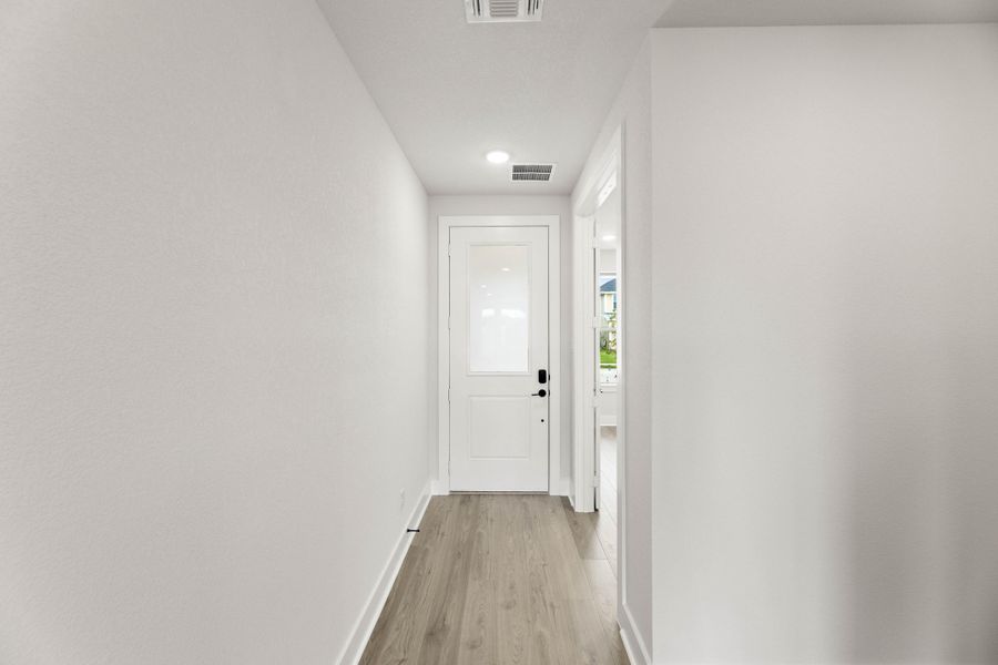 Representative unfurnished interior of a home built from the Magnolia by Tri Pointe Homes in Treeline, Justin (Image 12).