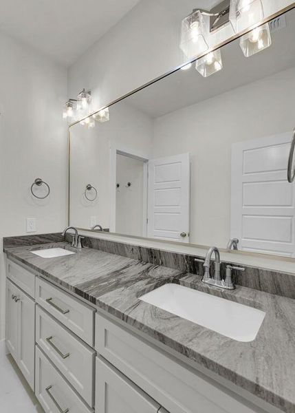 Full bath with double vanity