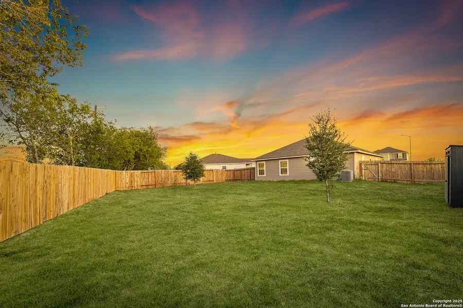 Exterior details and patio area of a home in Luckey Ranch, San Antonio (Image 24).